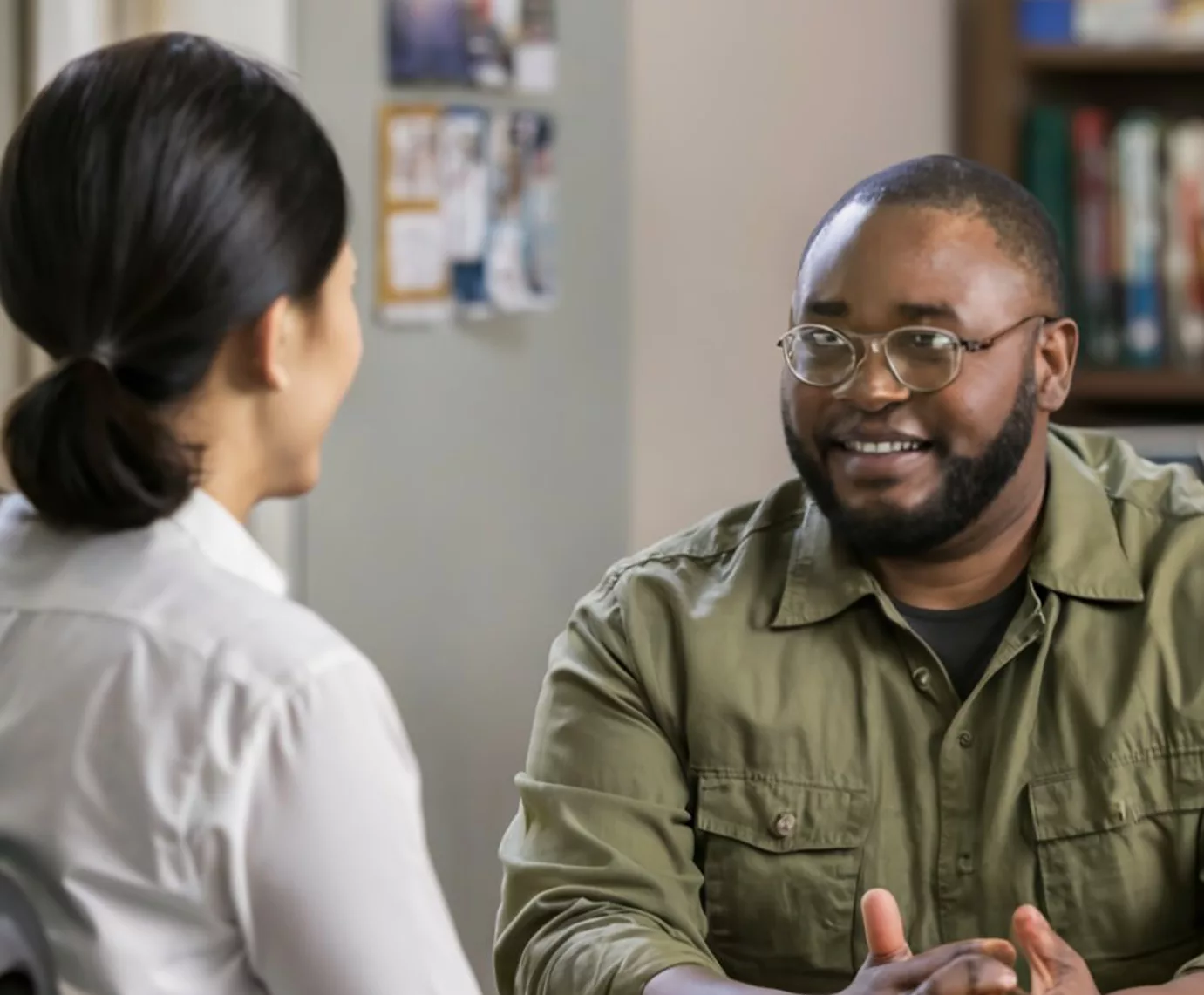 Staged photo of a one-on-one counseling conversation